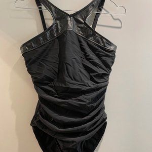 One piece black swimsuit with high neck